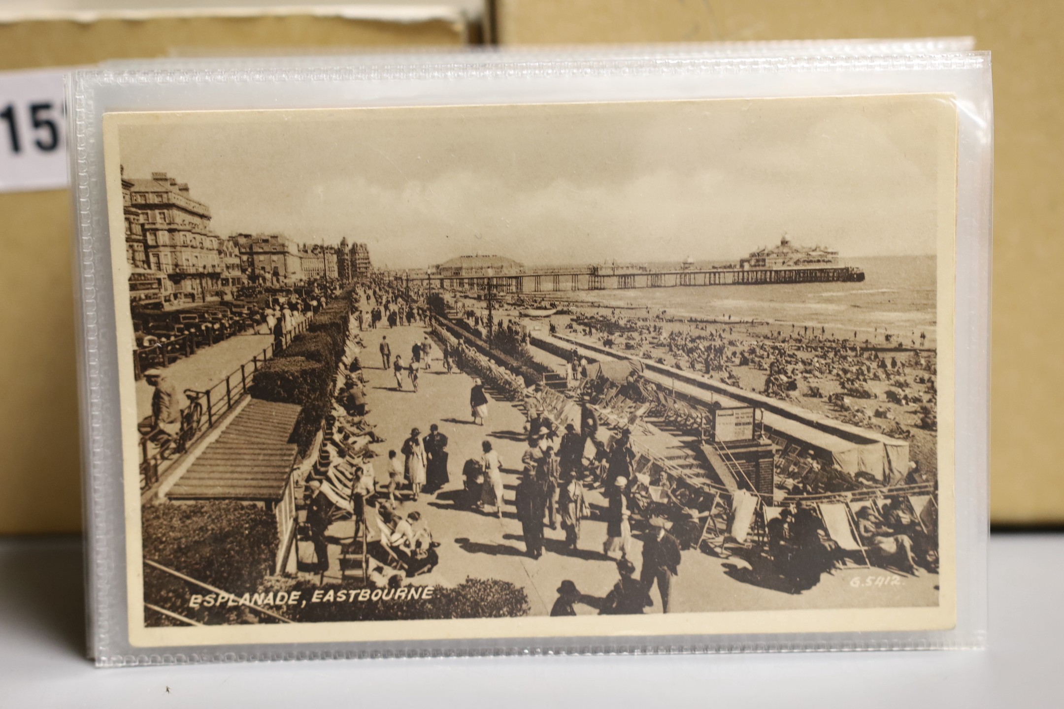 A quantity of postcards relating to Sussex towns